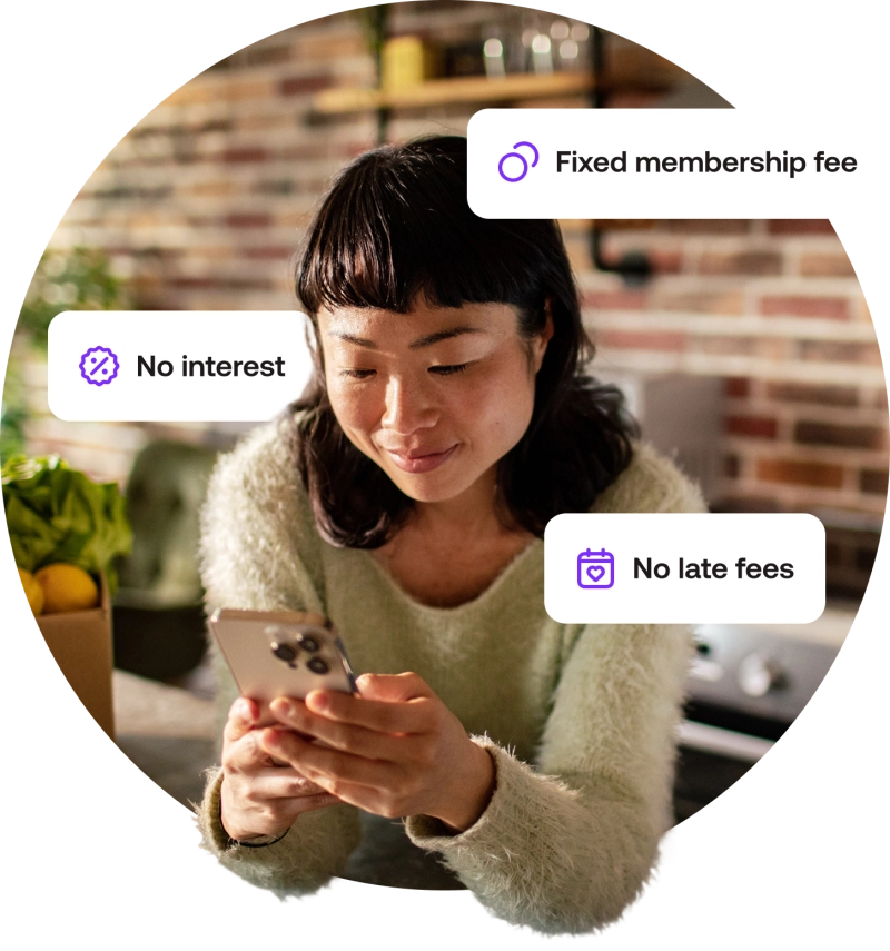 Photo of a woman checking her phone